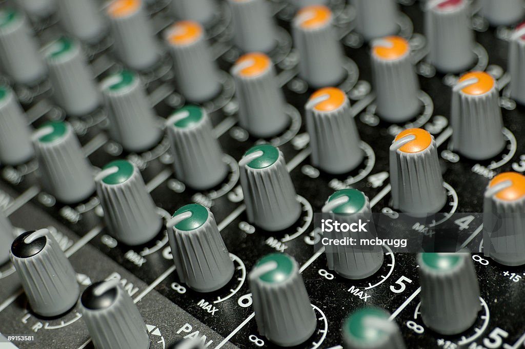 Knobs on a mixing deck audio mixing deck Adjusting Stock Photo