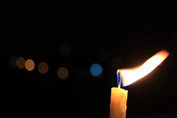 istock Fire and light from burning candle movement in darkness and bokeh background, hope, hopeless, guile, energy, classic, Life, End, Age, Time 891536716