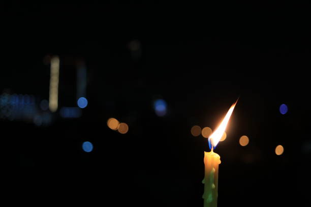 istock Fire and light from burning candle movement in darkness and bokeh background, hope, hopeless, guile, energy, classic, Life, End, Age, Time 891536752