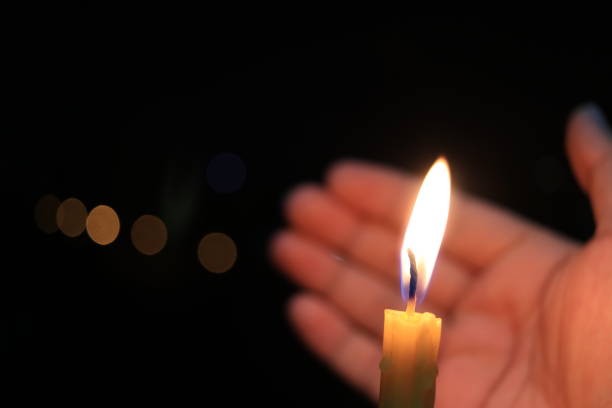 istock Fire and light from burning candle movement in darkness and bokeh background, hope, hopeless, guile, energy, classic, Life, End, Age, Time 891536808