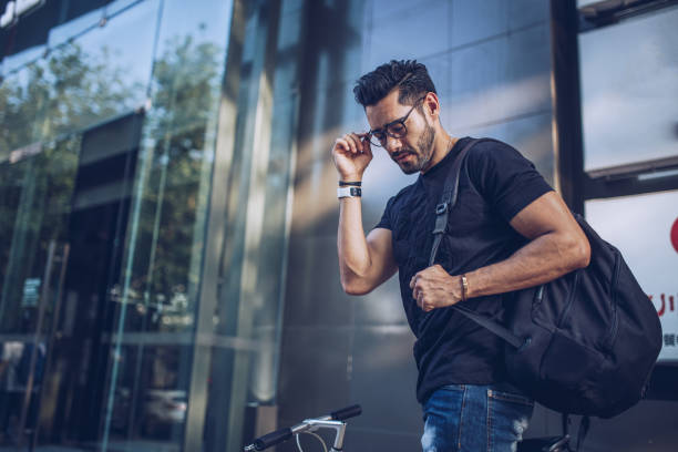 istock Man riding bicycle in city 891536972