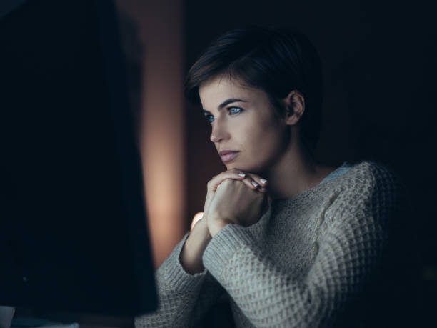 istock Woman connecting at night 891538414