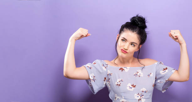 istock Powerful young woman in a success pose 891540746