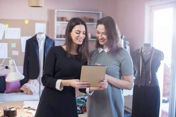 istock Fashion Designers Working In Their Art Studio 891541274