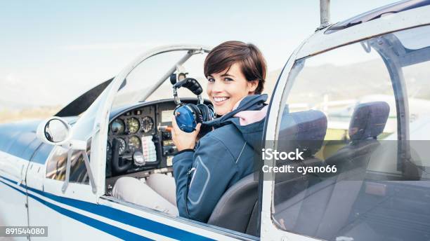 Pilot In The Aircraft Cockpit Stock Photo - Download Image Now - Pilot, Piloting, Learning