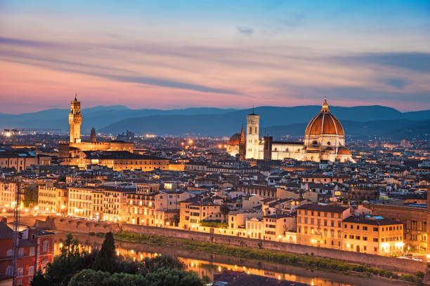 istock A fabulous panoramic view of Florence from Michelangelo Square in the evening lights. It is a pilgrimage of tourists and romantics. Duomo Cathedral. Italy, Tuscany 891547208