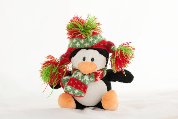 istock Penguins wearing a hat and a canvas on a white background. 891550324