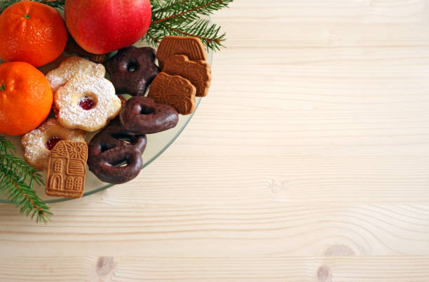istock Christmas cookies and fruits 891550422