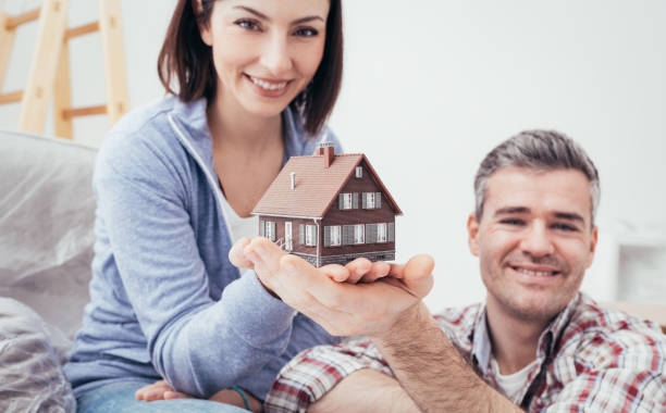 istock Couple building their house 891550444