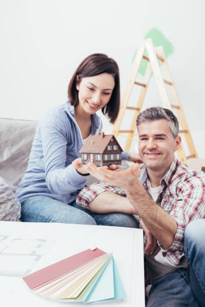 istock Couple building their dream house 891551090