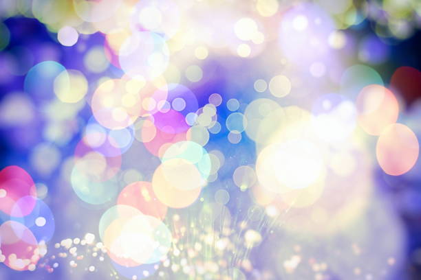 istock Abstract Festive background. Glitter vintage lights background with lights defocused. Christmas and New Year feast bokeh background with copyspace. 891557054
