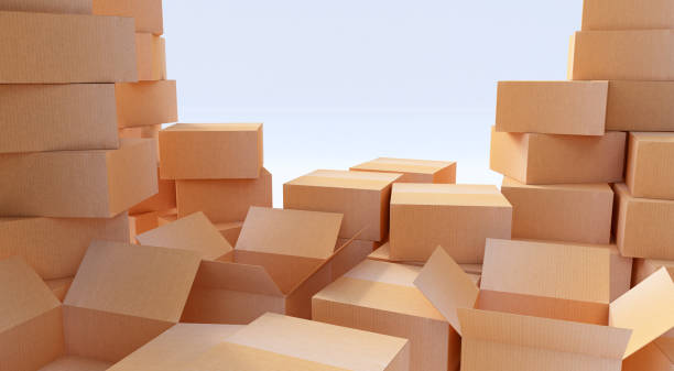 istock 3d rendering. Pile of cardboard boxes isolated on white. 891559620