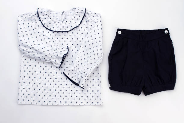 istock White top and navy shorts 891560538