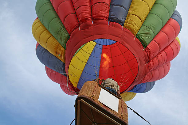 istock hot air balloon firing up 89156125