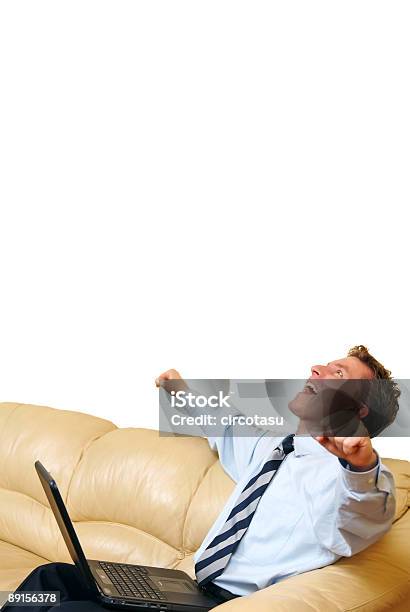 Young Businessman With Laptop Enjoying A Success Stock Photo - Download Image Now - Adult, Business, Casual Clothing