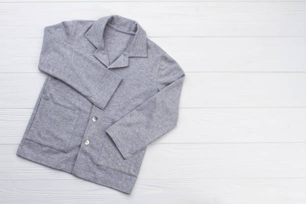 istock Gray shirt on white background 891566994
