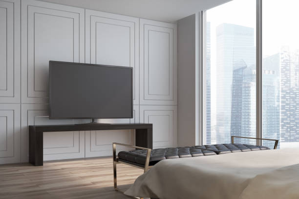 istock White living room, TV set side view 891569244