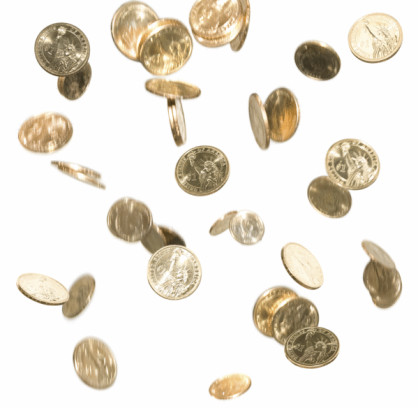 Gold coins raining down over a white background. Most of the coins are in motion. All are US Liberty Dollar coins. Isolated on a white background.