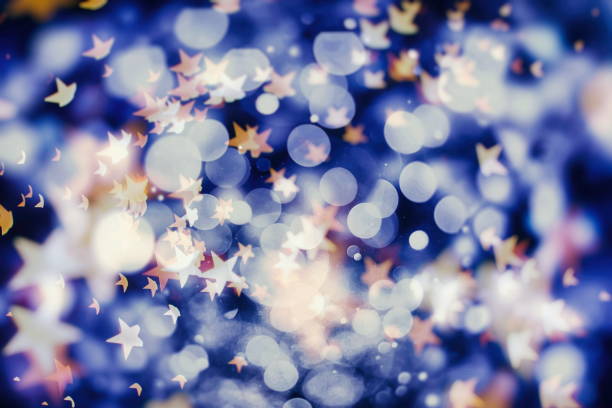 istock background with natural bokeh defocused sparkling lights. Colorful metallic texture with twinkling lights. Bright and vivid colors 891572170