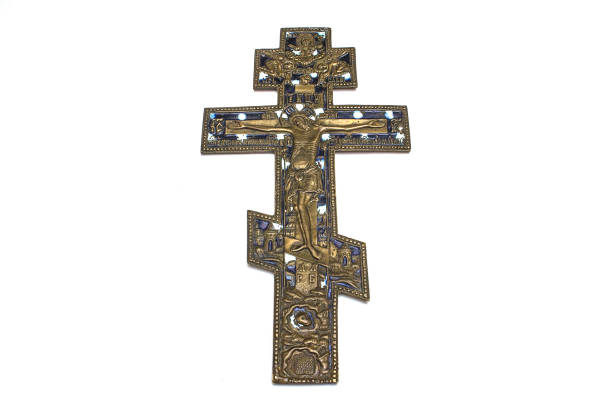 istock cross old orthodox copper on white isolated background 891573466