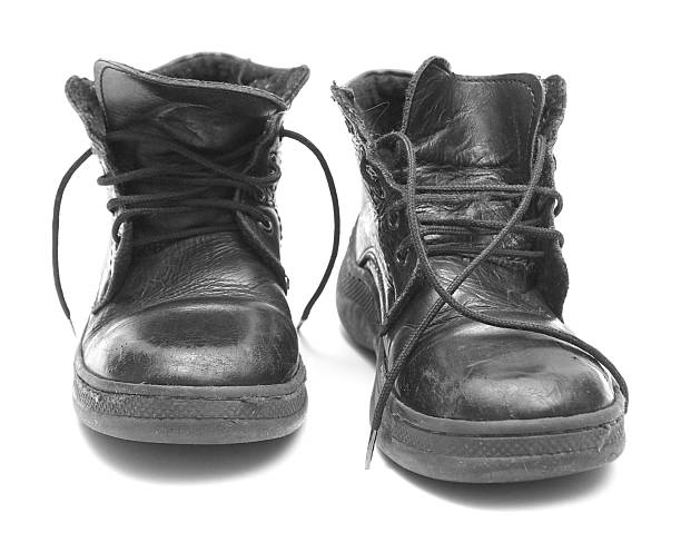 istock Pair of used children boots 89157546