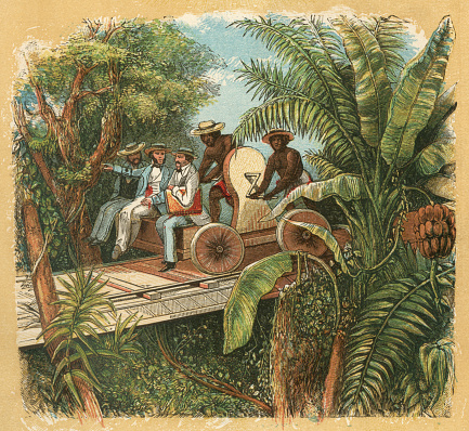 Three men being transported on an elevated railway in a crank handcar across part of the Isthmus of Panama. It is being operated by natives of Panama wearing straw hats to shield their heads from the sun.