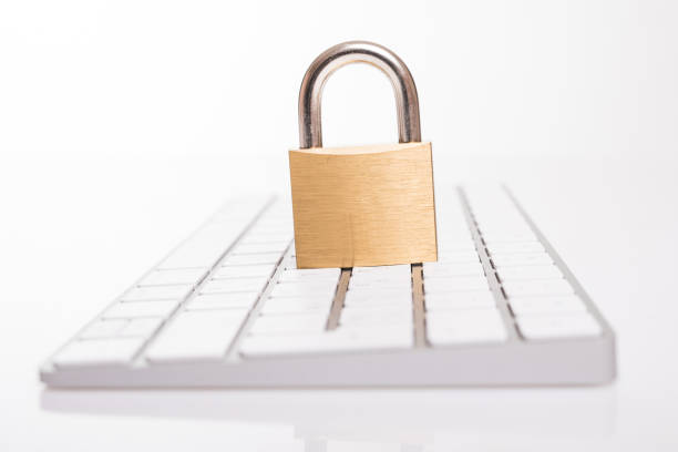 istock Padlock on black keyboard isolated on white background. Internet data privacy information security concept with free space 891589076