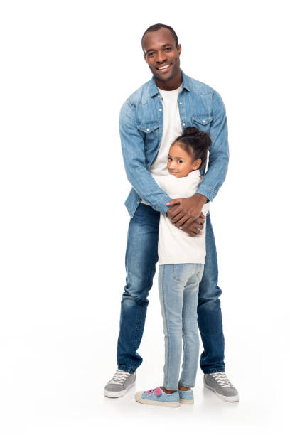 istock african american father and daughter hugging 891589470