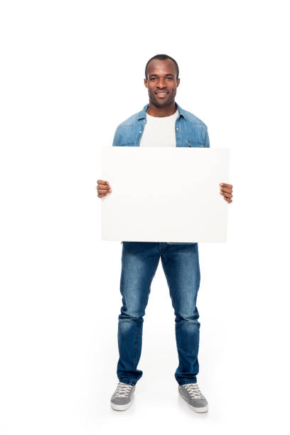 istock african american man with blank banner 891594334