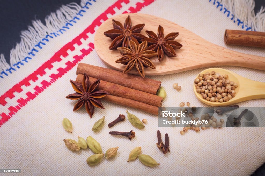 Assortment spice star anise, cinnamon sticks, cardamon, cloves and coriander seed Anise Stock Photo