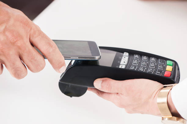 istock NFC Payment. Near Field Communication Mobile Payment 891600084