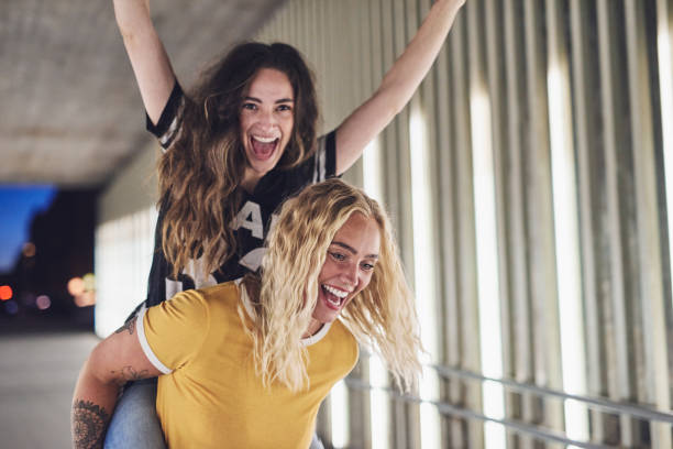 istock Two girlfriends have a great night out in the city 891600272