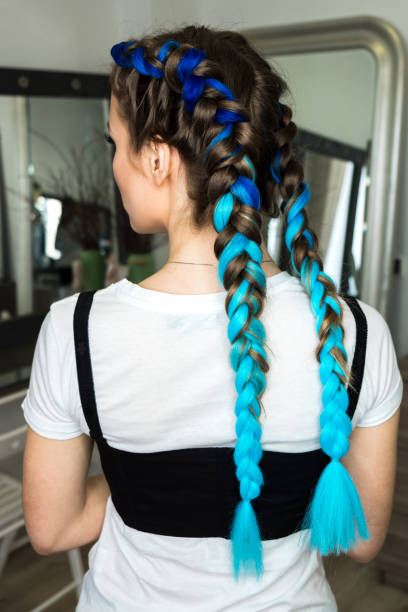istock Girl with blue braids 891600772