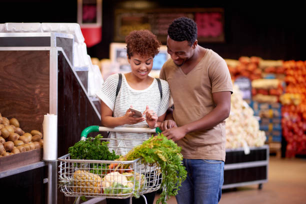 istock Ensuring they stay on track with their shopping budget 891600970