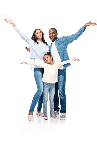 cheerful african american family with open arms smiling at camera isolated on white