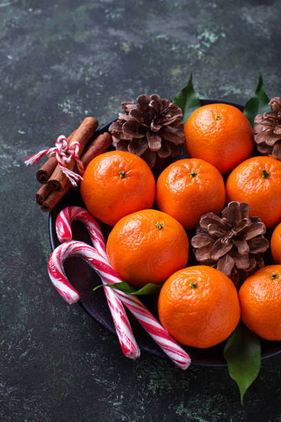 istock Christmas or New Year composition with tangerines 891605378