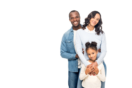 beautiful happy african american family smiling at camera isolated on white