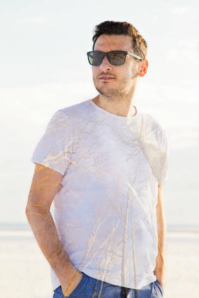 istock Double exposure young man with tree in the portrait 891608136