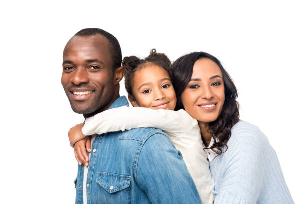 happy african american family happy african american family hugging and smiling at camera isolated on white the black womens expo stock pictures, royalty-free photos & images