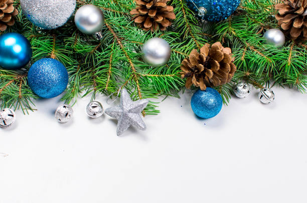 istock christmas background with fir, blue and silver balls 891608608
