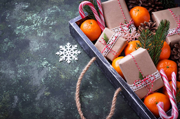 istock Christmas or New Year composition with tangerines 891618784