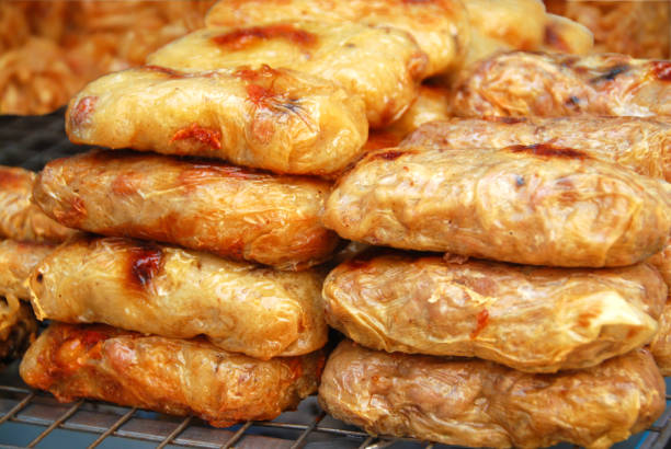 istock Thai snack of deep -fried stuffed filo dough. 891634284