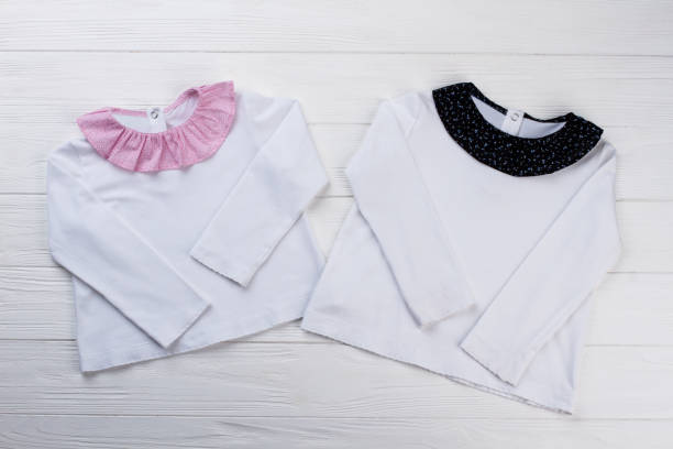 istock White blouses for baby girl 891634644