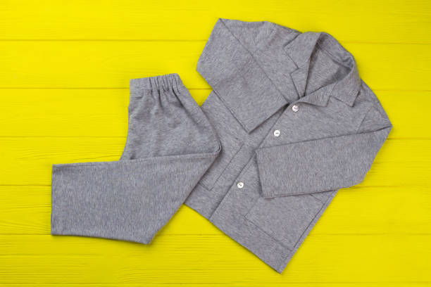 istock Boys pajama set on yellow 891644146