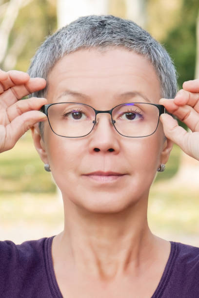 istock Mature woman in progressive glasses 891644220