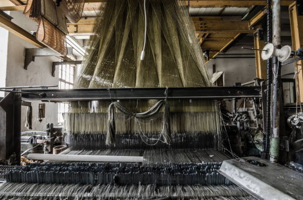 istock clamped yarn in spinning 891656226