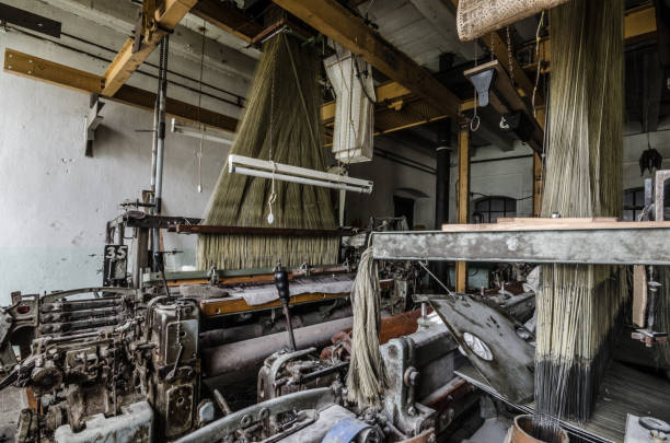 istock machines with yarn in spinning 891656336