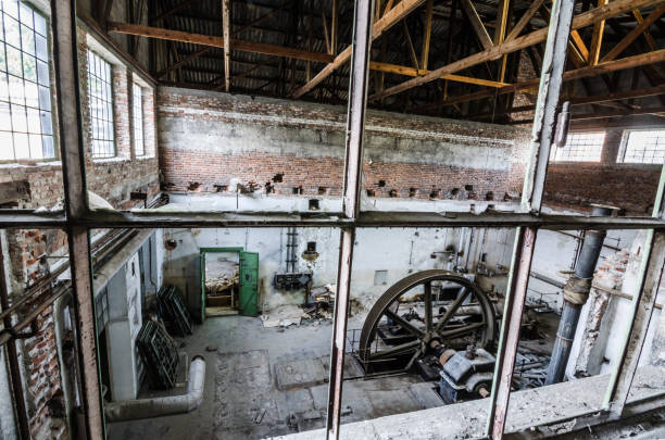 istock view in factory building with drive wheel 891656548