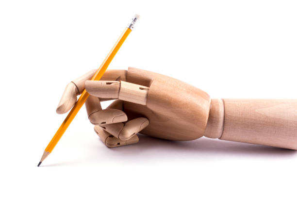 istock Wooden hand isolated on white background. Drawing with a pencil 891657452