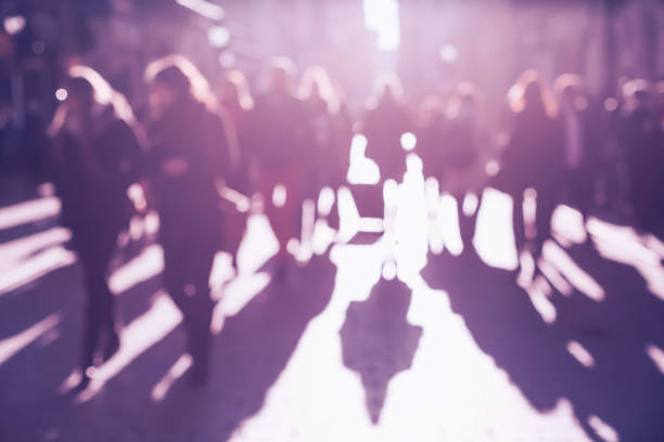 istock Blurred Ultra Violet crowd of people 891657982